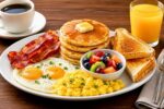 Hearty Breakfast Spread on a Rustic Wooden Table with Fresh and Delicious Morning Favorites