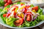 Fresh and Colorful Garden Salad on a Wooden Table – Healthy Homemade Vegetable Salad Recipe for Lunch or Dinner
