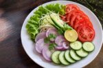 Fresh Veggie Salad on a Wooden Table – Healthy Garden Vegetable Salad with Fresh Ingredients and Rustic Style